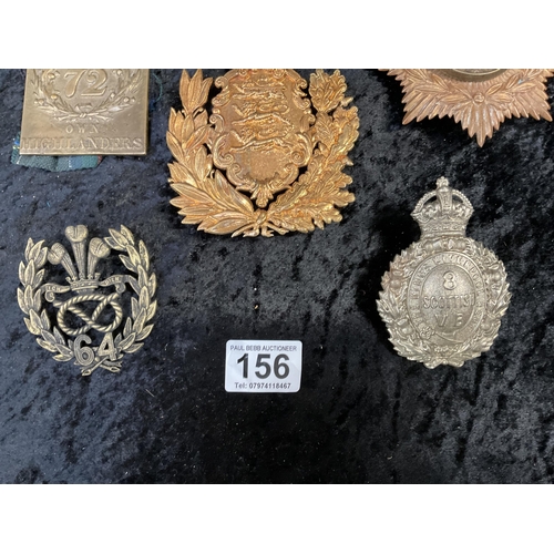 156 - QTY OF MILITARY HELMET BADGES ETC