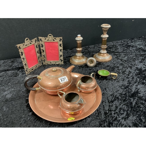 236 - COPPER 4 PIECE TEA SET,CANDLESTICKS A/F AND BRASS PHOTO FRAME