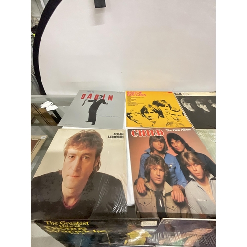 125 - BOX AND CASE OF LP'S & SINGLES TO INCLUDE BEATLES ETC