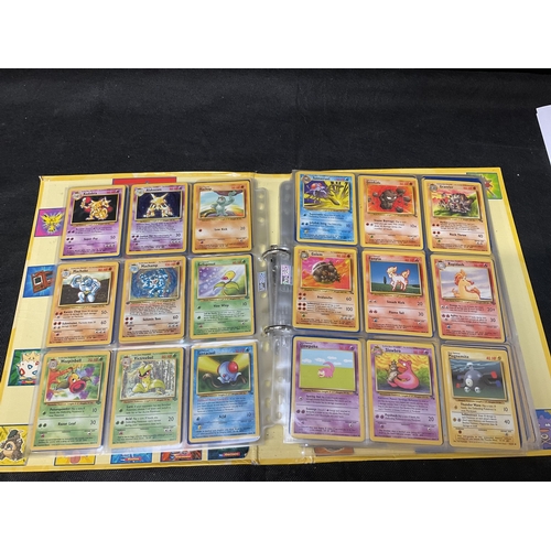 186 - 2 POKEMON TRADING CARD FOLDERS AND CONTENTS