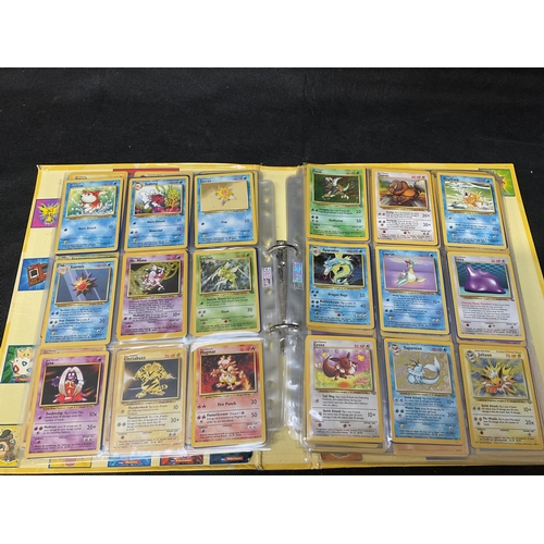 186 - 2 POKEMON TRADING CARD FOLDERS AND CONTENTS