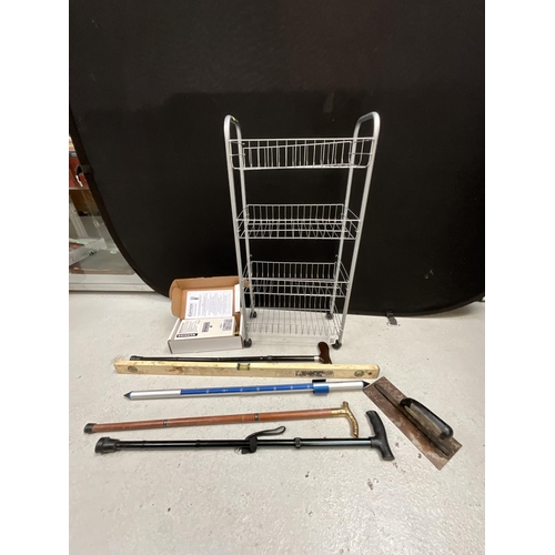 297 - WALKING STICKS, SPIRIT LEVEL AND VEG RACK ETC