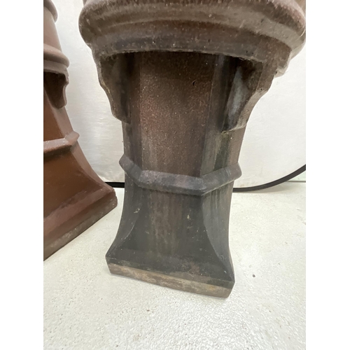 299 - PAIR OF BROWN TREACLE GLAZED VICTORIAN CROWN TOPPED CHIMNEY POTS - A/F H29