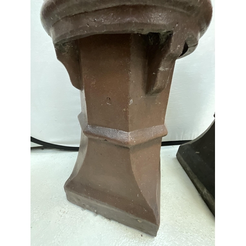 299 - PAIR OF BROWN TREACLE GLAZED VICTORIAN CROWN TOPPED CHIMNEY POTS - A/F H29