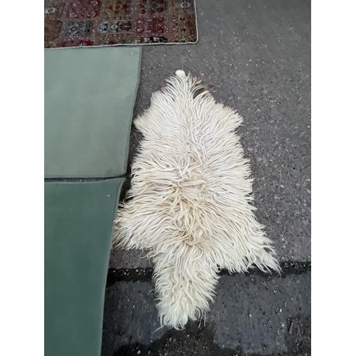 386 - 2 CARPETS AND SHEEPSKIN RUG
48