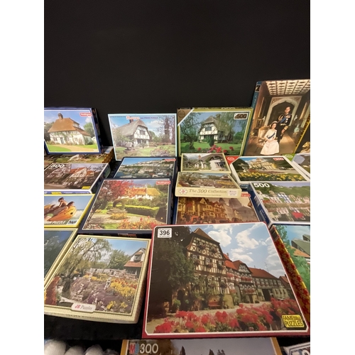 396 - 2 BOXES AND CRATE OF VINTAGE JIGSAWS ETC