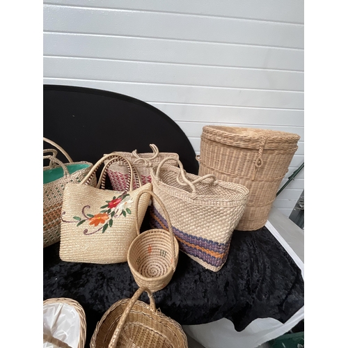 411 - CRATE OF BASKETS AND A LINEN BASKET