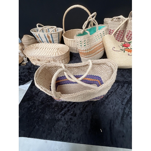 411 - CRATE OF BASKETS AND A LINEN BASKET