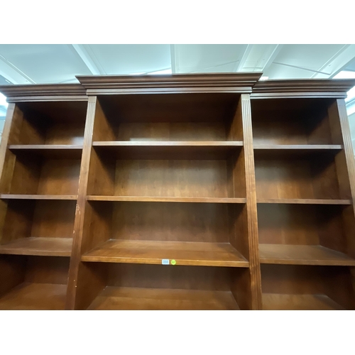 358 - REPRODUCTION MAHOGANY BREAKFRONT LIBRARY BOOKCASE OF LARGE PROPORTIONS H101