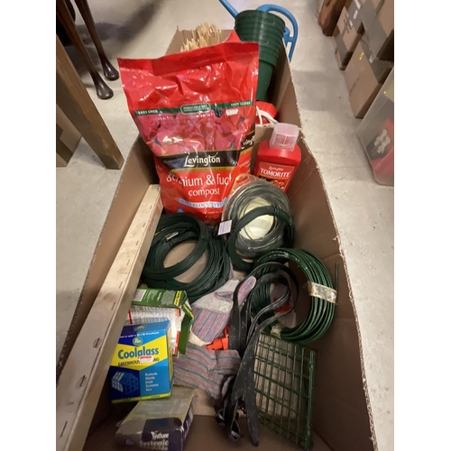 375 - 2 BOXES OF GARDEN ITEMS AND HOSE ON REEL