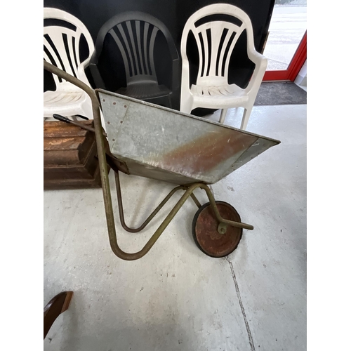 276A - WHEELBARROW, TIN TRUNK H14