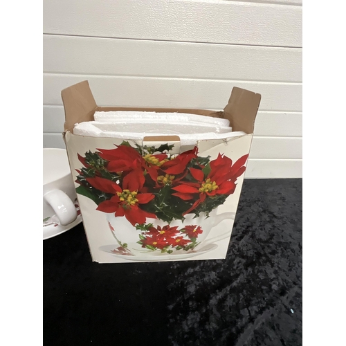 55 - GIANT TEA CUP PLANTER IN BOX H7.5