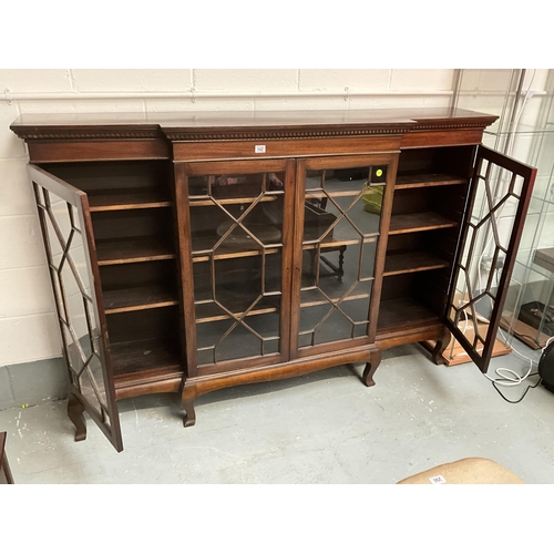 142 - EARLY MAHOGANY BREAKFRONT 4 DOOR ASTRAGAL GLAZED BOOKCASE ON 6 LEGS COMPLETE WITH KEYS H51