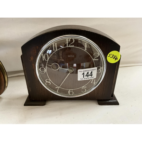 144 - SMITHS OAK CASED MANTLE CLOCK AND COURVOISIER CANON BOTTLE STAND