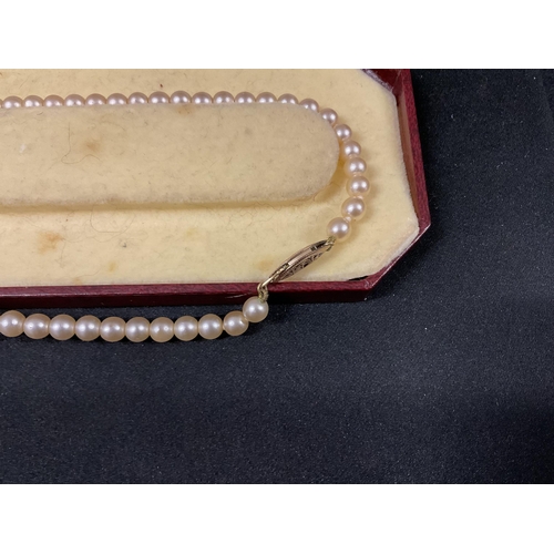 215A - 2 BOXED SET OF STRING IMATATION PEARLS