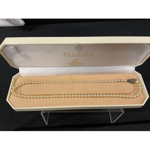 215A - 2 BOXED SET OF STRING IMATATION PEARLS