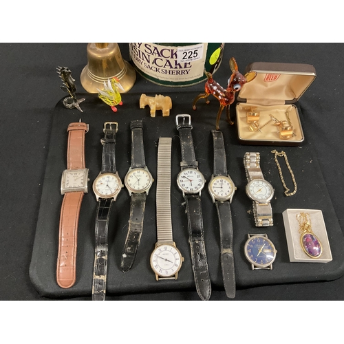 225 - TIN OF COLLECTABLES TO INCLUD WRIST WATCHES, CUFFLINKS AND BRASS BELL