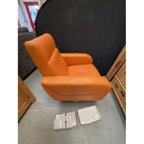 354 - ORANGE LEATHER SWIVEL CHAIR ON CHROME BASE COMPLETE WITH LEATHER CARE KIT