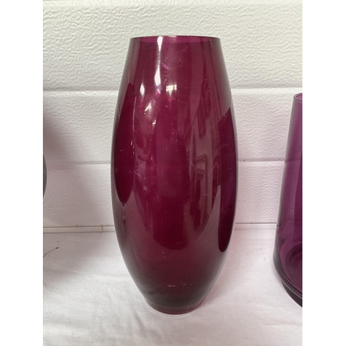 57 - 2 COLOURED GLASS VASES AND A GOBLET