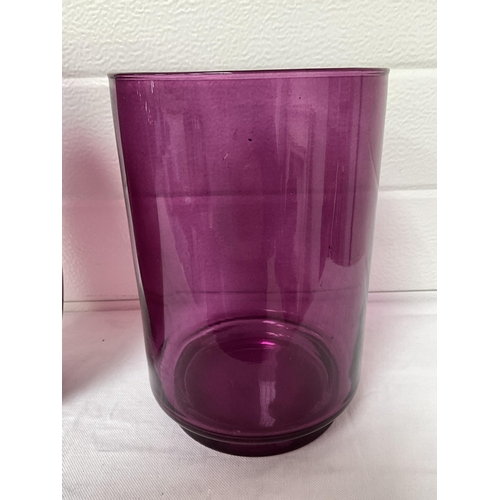 57 - 2 COLOURED GLASS VASES AND A GOBLET