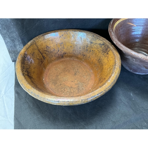 58 - 3 EARLY TREACLE GLAZED POTTERY BOWLS A/F