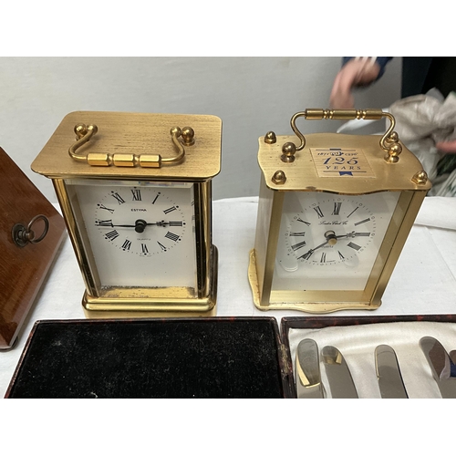 62 - BOX OF ODDS TO INCLUDE ANGLE POISE LAMP, MANTLE CLOCKS, CUTLERY AND METRONOME