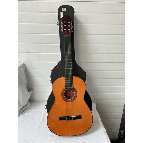 65 - ACOUSTIC GUITAR IN CASE