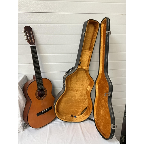 65 - ACOUSTIC GUITAR IN CASE