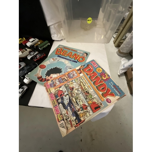 129 - CRATE OF TOY CARS AND A QTY OF COMICS