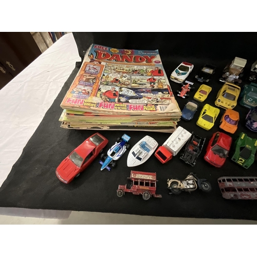 129 - CRATE OF TOY CARS AND A QTY OF COMICS