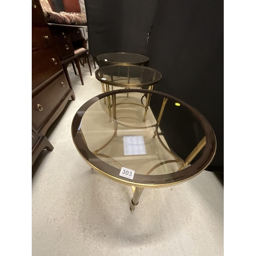 303 - SET OF 3 MATCHING RETRO BRASS AND SMOKED GLASS COFFEE TABLE AND LAMP TABLES
LARGEST H16