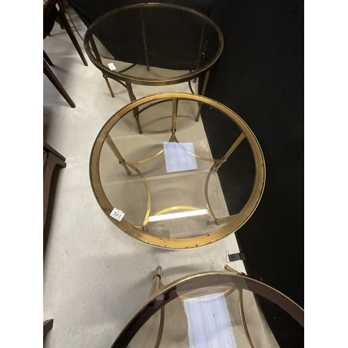 303 - SET OF 3 MATCHING RETRO BRASS AND SMOKED GLASS COFFEE TABLE AND LAMP TABLES
LARGEST H16