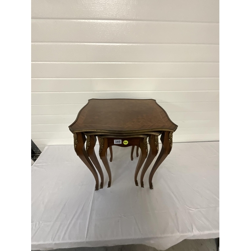 349 - REPRODUCTION ITALIAN STYLE NEST OF 3 TABLES WITH BRASS FRETWORK DECORATION
LARGEST H23.5