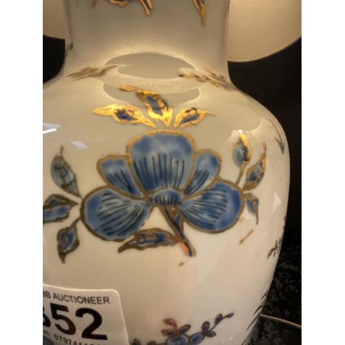 352 - PAIR OF CERAMIC BLUE AND GOLD PATTERNED TABLE LAMPS WITH MAHOGANY BASE COMPLETE WITH SHADES H34