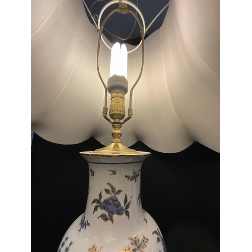 352 - PAIR OF CERAMIC BLUE AND GOLD PATTERNED TABLE LAMPS WITH MAHOGANY BASE COMPLETE WITH SHADES H34