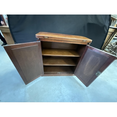 358 - VICTORIAN MAHOGANY CABINET WITH 2 DOORS AND FOLDING TOP TO CONVERT INTO WRITING TABLE H33