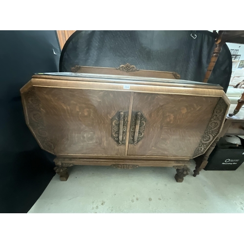 394 - ART DECO OAK SIDEBOARD WITH 2 DOORS CARVED DECORATION ON STRETCHERED BASE WITH FITTED INTERIOR H39