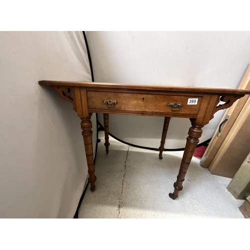 395 - EDWARDIAN MAHOGANY WRITING TABLE WITH SINGLE DRAWER AND INSET LEATHER TOP ON TURNED LEGS H29