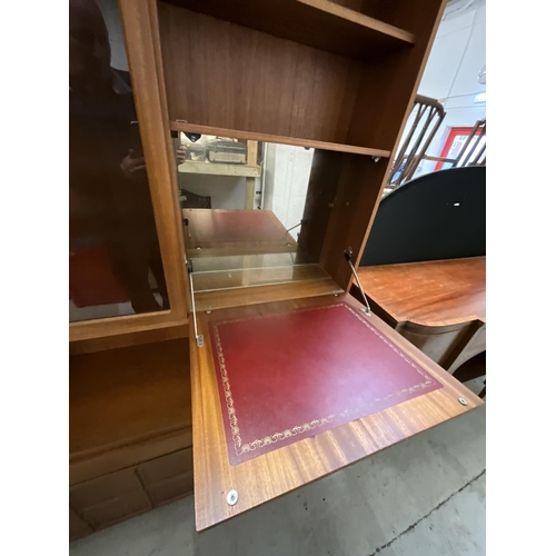 407 - VINTAGE BADGED MACKINTOSH TEAK LOUNGE UNIT, TOP WITH 2 GLASS DOORS AND DRINKS COMPARTMENT, BASE 3 DR... 