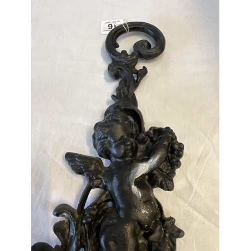 16 - CAST IRON CHERUB DOORSTOP H17