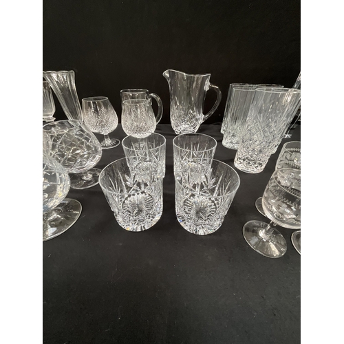 61 - 2 BOXES OF GLASSWARE TO INCLUDE WATER JUGS DRINKING GLASSES, CANDLESTICKS ETC