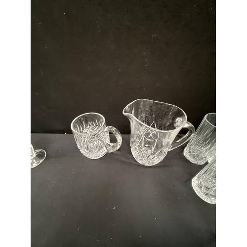 61 - 2 BOXES OF GLASSWARE TO INCLUDE WATER JUGS DRINKING GLASSES, CANDLESTICKS ETC