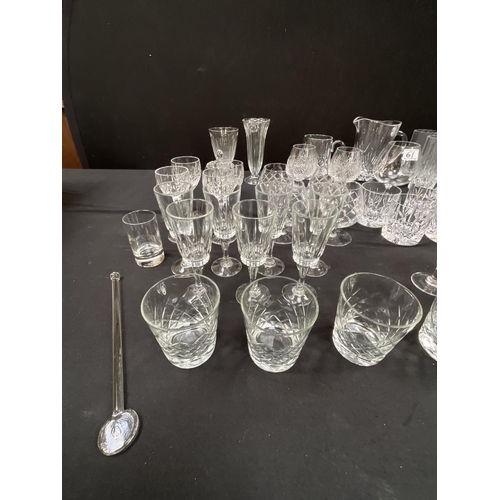 61 - 2 BOXES OF GLASSWARE TO INCLUDE WATER JUGS DRINKING GLASSES, CANDLESTICKS ETC