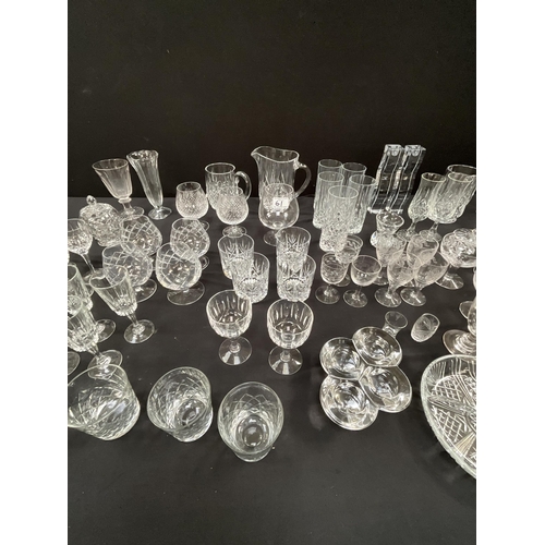 61 - 2 BOXES OF GLASSWARE TO INCLUDE WATER JUGS DRINKING GLASSES, CANDLESTICKS ETC