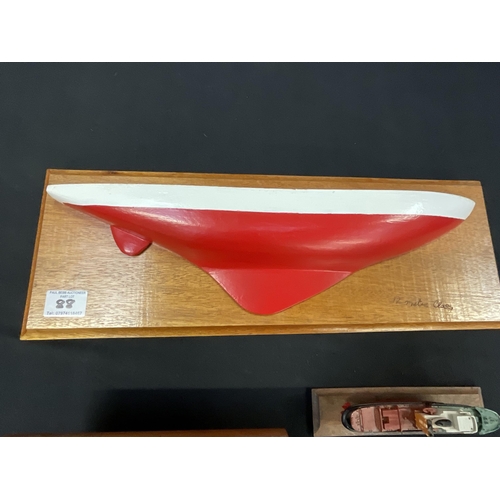 88 - WORLD MARINE TRANSPORT & SALVAGE 1989 BAROMETER, BOAT HULL PLAQUE, SMALL MODEL BOAT ON STAND