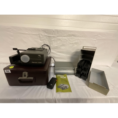 92 - ZEISS IKON VINTAGE PROJECTOR IN CASE, SLIDE CASE AND A TRANSPARENCY VIEWER