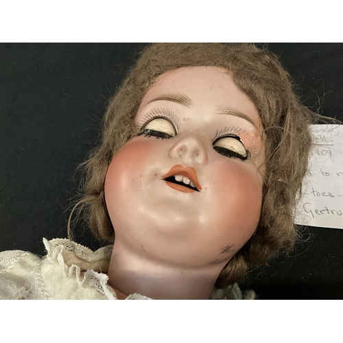 341 - GERMAN BISQUE HEADED JOINTED DOLL DATED 1909 - GERTRUDE- AS FOUND