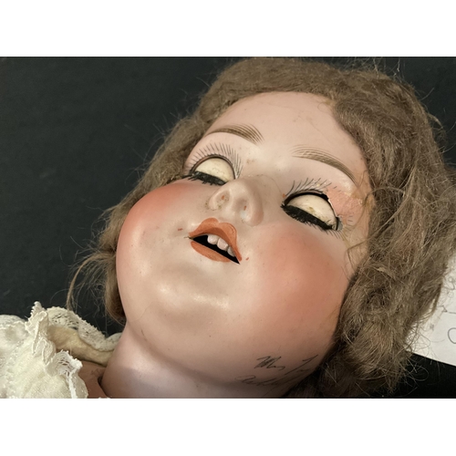 341 - GERMAN BISQUE HEADED JOINTED DOLL DATED 1909 - GERTRUDE- AS FOUND