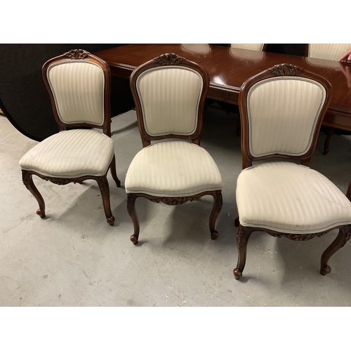 358 - REPRODUCTION MAHOGANY PULL OUT DINING TABLE WITH 1 LEAF ON REEDED LEGS AND BRASS CASTORS AND 6 MATCH... 