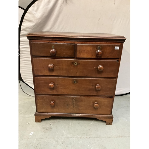 384 - EARLY GEORGIAN OAK CHEST OF DRAWERS OF SMALL PROPORTIONS H39